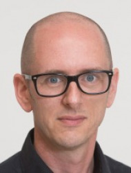 Dr. Nicolas John